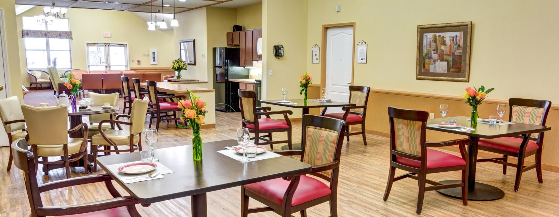 a dining room with a table set