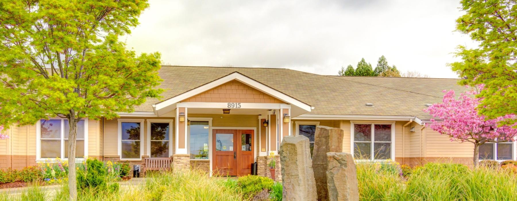 a house with a stone wall